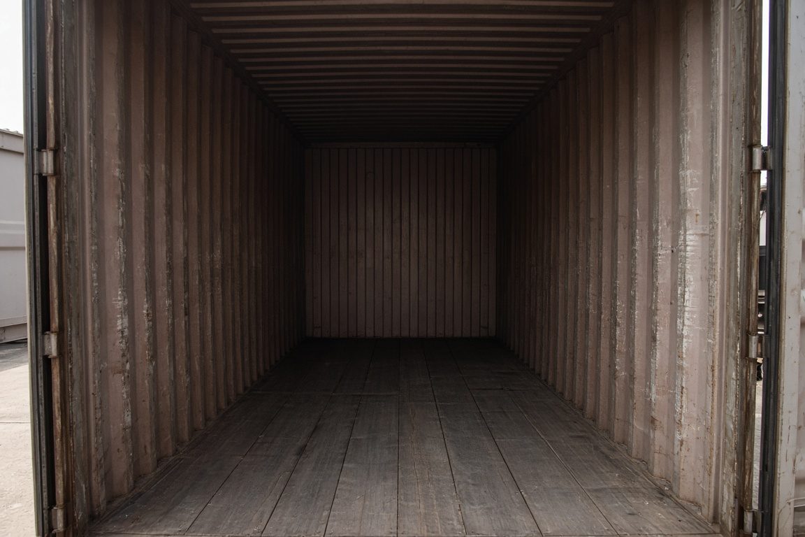 Empty shipping container showing the interior loading space and door opening
